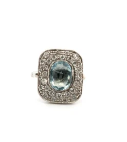 Bague en platine avec aigue-marine centrale et diamants environnants