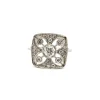 Bague en platine avec diamant central et diamants latéraux