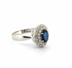 Bague en platine avec saphir central et diamants