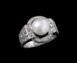 Bague en platine, diamants et perle fine Art Déco