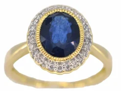 Bague entourage en or avec diamants et saphir