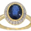 Bague entourage en or jaune avec diamants et saphir