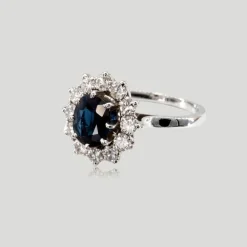 Bague entourage saphir diamants
