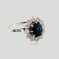 Bague entourage saphir diamants