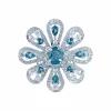 Bague fleur diamants, topazes, or blanc