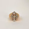 Bague fleur or jaune à godrons