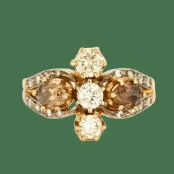 Bague fleur stylisée or jaune, diamants jaunes et bruns