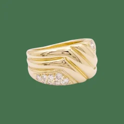 Bague godrons en or jaune et diamants.