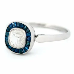 Bague halo en platine avec saphir et diamant