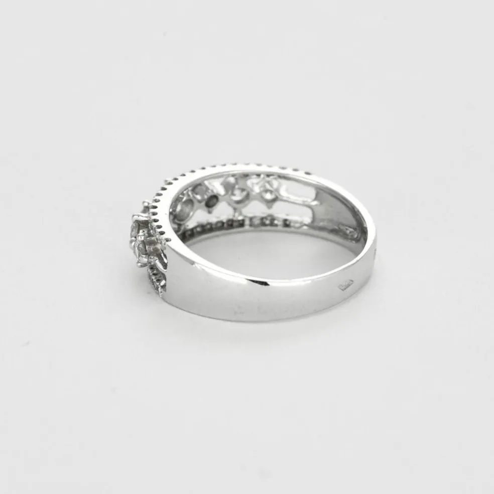 Bague jarretière or gris et diamants
