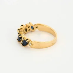 Bague jarretière or jaune saphirs diamants