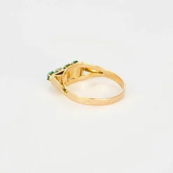 Bague jarretière turquoises en or rose