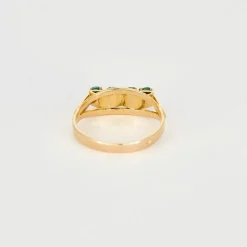 Bague jarretière turquoises en or rose