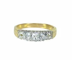 Bague jonc en or jaune 18 carats sertie de 5 diamants, vers 1900