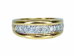 Bague jonc en or jaune 18 carats sertie de 9 diamants