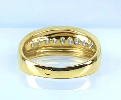 Bague jonc en or jaune 18 carats sertie de 9 diamants