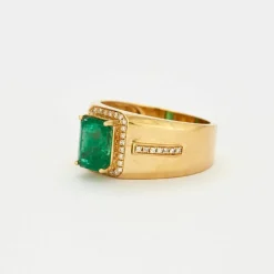 Bague jonc en or jaune émeraude et diamants