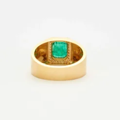 Bague jonc en or jaune émeraude et diamants