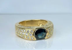 Bague jonc en or jaune, saphir et diamants