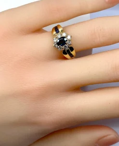 Bague jonc marguerite en or jaune en saphirs et diamants