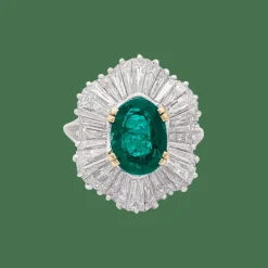 Bague "Jupe" platine, or jaune, diamants, émeraude.