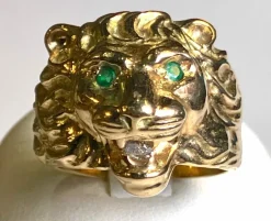 Bague lion or jaune émeraudes