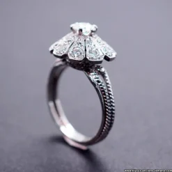 Bague marguerite diamants époque Art Déco