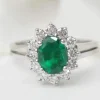 Bague marguerite en or blanc émeraude et diamants