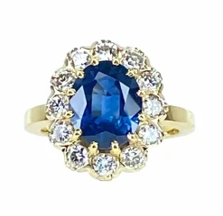 Bague marguerite en or jaune 18 carats, saphir 3,50 carats et diamants