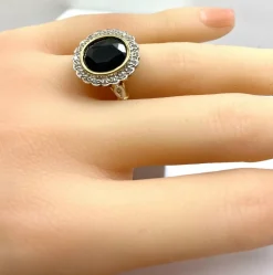 Bague marguerite en or jaune 18 carats, saphir et diamants