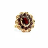 Bague marguerite or jaune grenats