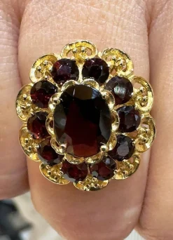 Bague marguerite or jaune grenats