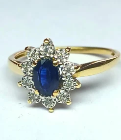 Bague marguerite or jaune, saphir, diamants