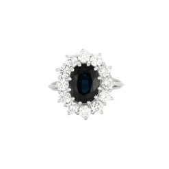 Bague marguerite saphir entourage diamants en or blanc