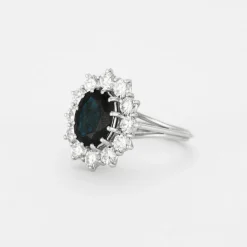 Bague marguerite saphir entourage diamants en or blanc