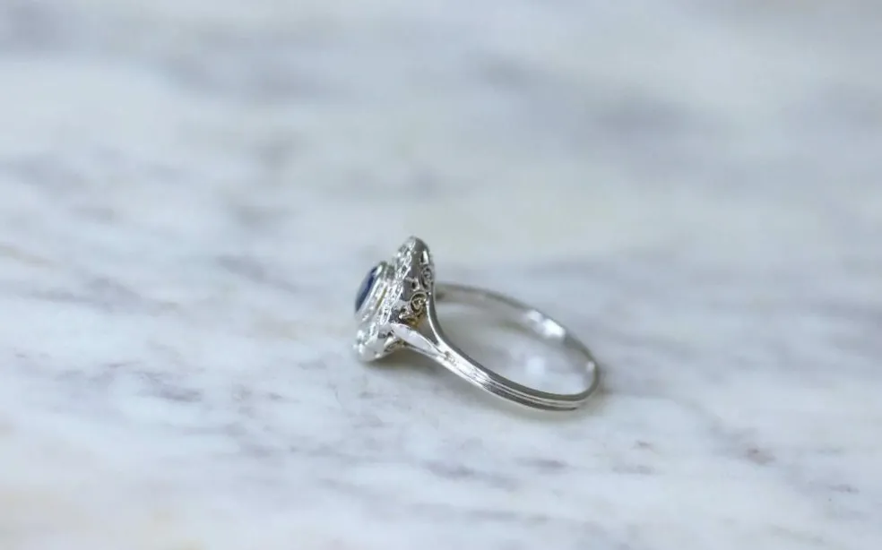 Bague marguerite saphir entourage diamants