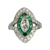 Bague marquise Art Déco émeraudes diamants