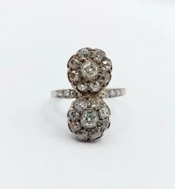 Bague marquise art deco Platine formant deux marguerites de diamant taille ancienne