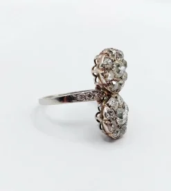 Bague marquise art deco Platine formant deux marguerites de diamant taille ancienne