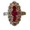 Bague marquise en or, diamants et rubis.