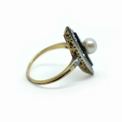 Bague Marquise or jaune, onyx, diamants
