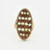 Bague marquise or jaune rubis perles