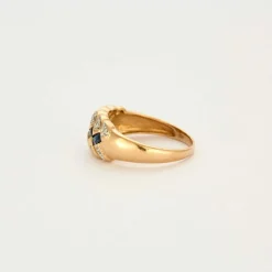 Bague motif tresse en or jaune, saphir et diamants