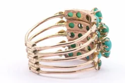 Bague multi-anneaux en or jaune sertie de turquoises