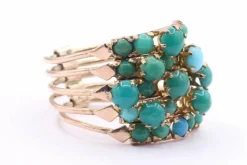 Bague multi-anneaux en or jaune sertie de turquoises