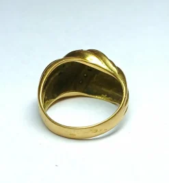 Bague noeud en or jaune gris et diamants