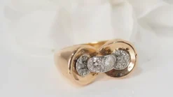Bague nœud en or rose platine et diamants