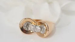 Bague nœud en or rose platine et diamants