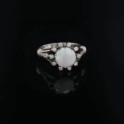 Bague opale ronde diamants or blanc