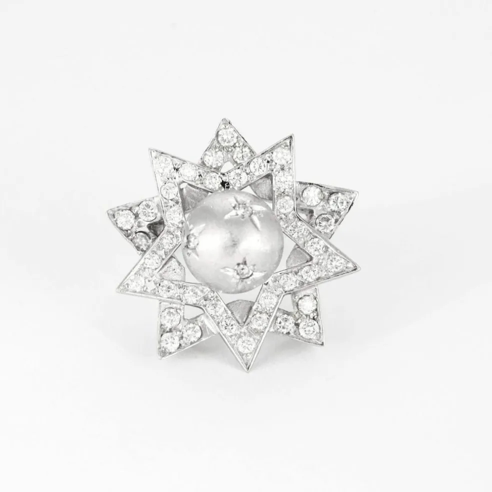 Bague or blanc à motif étoilé et diamants